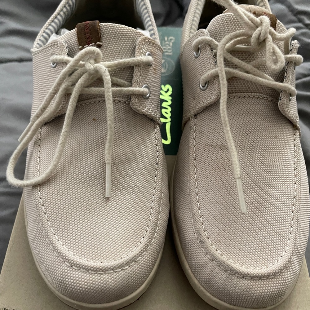 Clarks brand slip ons.